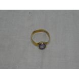 A 22ct gold dress ring set amethyst