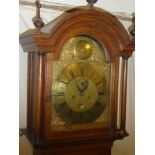 An 18th Century longcase clock with 12" brass arched dial by "Jam.