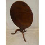 A 19th Century mahogany circular snap-top occasional table on turned column with tripod base