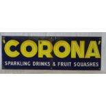 An enamelled rectangular advertising sign "Corona Sparkling Drinks and Fruit Squashes",