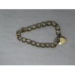 A 9ct gold chain link bracelet with 9ct padlock clasp