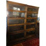 A pair of Globe Wernicke oak five tier stacking bookcases with folding glazed fronts and base