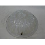 A Continental opaline glass circular inverted dome ceiling shade with sunflower decoration,