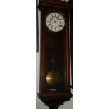 A Vienna regulator wall clock with circular enamelled dial,