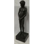 A good quality modern bronze figure of a standing nude boy,