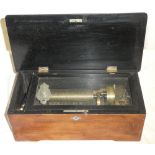 A 19th Century Continental table music box with ebonised mounts,
