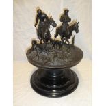 A 19th Century Russian bronze group of a hunting party with two riders on horseback and numerous
