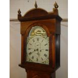 A 19th Century longcase clock by C Dixon of Hexham with 13" painted arched dial,