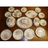 A late Victorian pottery part dinner set with floral transfer decoration comprising three various