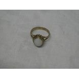 A 9ct gold dress ring set opal