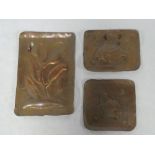 Three small Newlyn copper rectangular dishes with fish and seaweed decoration