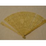 A 19th Century Japanese carved ivory traditional fan with figure decorated panels (af) 7" long