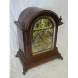A good quality German bracket clock with gilt and silvered arched dial with two additional