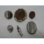 A selection of various dress brooches including agate mounted oval brooches,