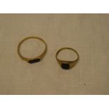 Two various 9ct gold dress rings set black stones (one damaged)