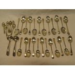 A set of late Victorian silver table cutlery comprising ten serving spoons,