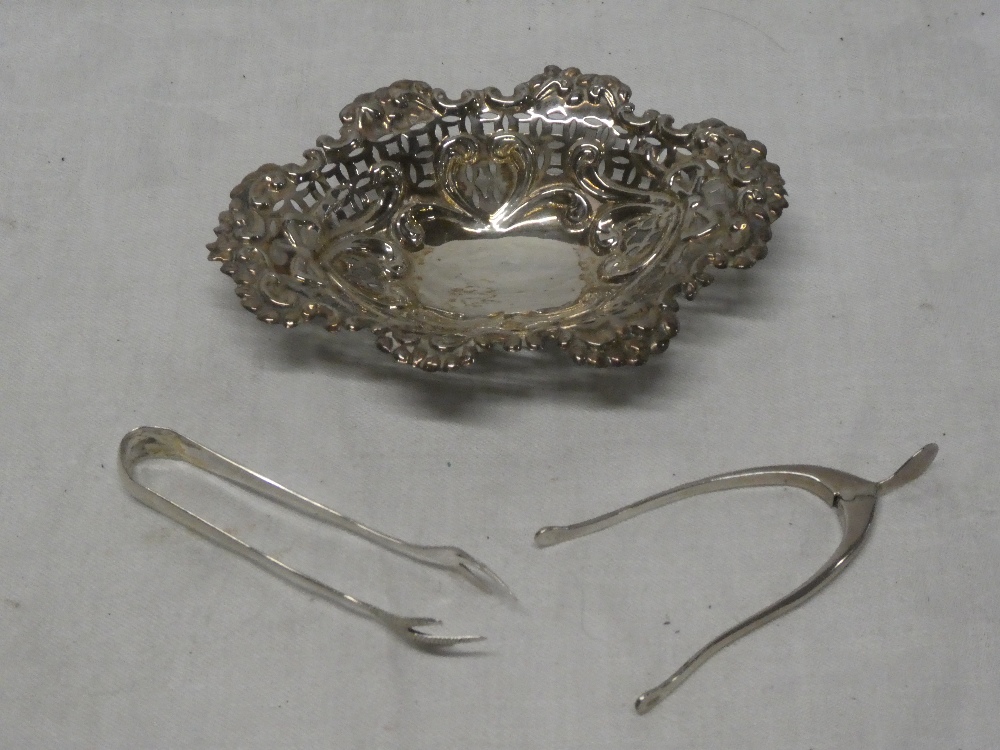 A pair of silver sprung wishbone sugar tongs,