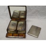 A pair of gentleman's silver mounted hairbrushes and matching comb,