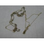 A 9ct gold pendant necklace set peridot and one other pearl mounted necklace (2)