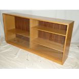 A 1960/70s oak bookcase by Gordon Russell with sliding glazed doors.