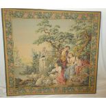 A large Continental tapestry panel depicting figures within a garden scene,.