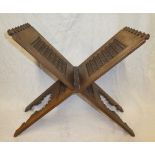 An Eastern carved wood folding Koran stand with beadwork decorated panels,