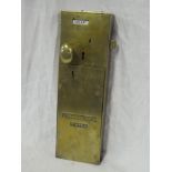 An old brass penny operated toilet door lock by Lockerbie & Wilkinson of Tipton with key,