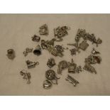 A selection of 40 various silver and other ornamental charms