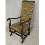 A Williams and Mary-style oak and beech open arm occasional chair with upholstered seat and back on