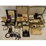 Three boxes containing a large selection of various costume jewellery