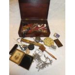 A jewellery box containing various costume jewellery together with brass mounted spirit level,