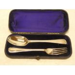 A Victorian silver spoon and fork with engraved initials in velvet lined case,