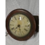 A 19th Century Black Forest post alarm wall clock with painted circular dial in polished mahogany