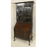 An Edwardian mahogany bureau bookcase,