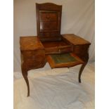 A good quality French inlaid tulipwood combination dressing table/writing deck with triple hinged