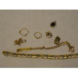 A selection of various jewellery including two 9ct gold wishbone-style rings,