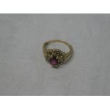 A 14ct gold dress ring set amethyst,