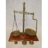 An old brass balance scales by Fairbanks of Birmingham with brass pans,