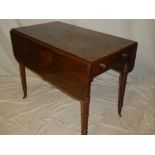 A Victorian mahogany rectangular Pembroke table with a drawer in one end,