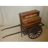 An unusual Spanish mini monkey barrel organ by Faventia marked "Vicente Llinares Faventia