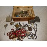 A jewellery box containing a quantity of various costume jewellery including necklaces,