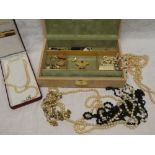 A jewellery box containing a selection of various jewellery including 9ct gold and other earrings,