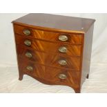 A good quality small polished mahogany bow front chest of four long graduated drawers with brass