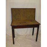 A 19th Century mahogany rectangular turnover top card table on square shaped legs