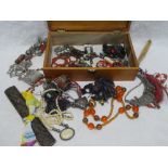 A jewellery box containing various costume jewellery, Eastern silvered necklace,