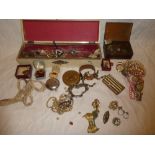 A selection of various costume jewellery including necklaces, brooches,