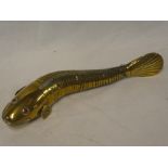 An old Eastern brass articulate fish,