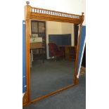 A Victorian rectangular over mantel mirror in rectangular oak frame with bobbin turned decoration,