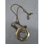 A 9ct gold circular coin pendant with 9ct gold chain link necklace
