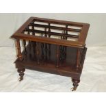 A 19th Century rosewood rectangular music Canterbury/magazine rack bu John Taylor & Sons,